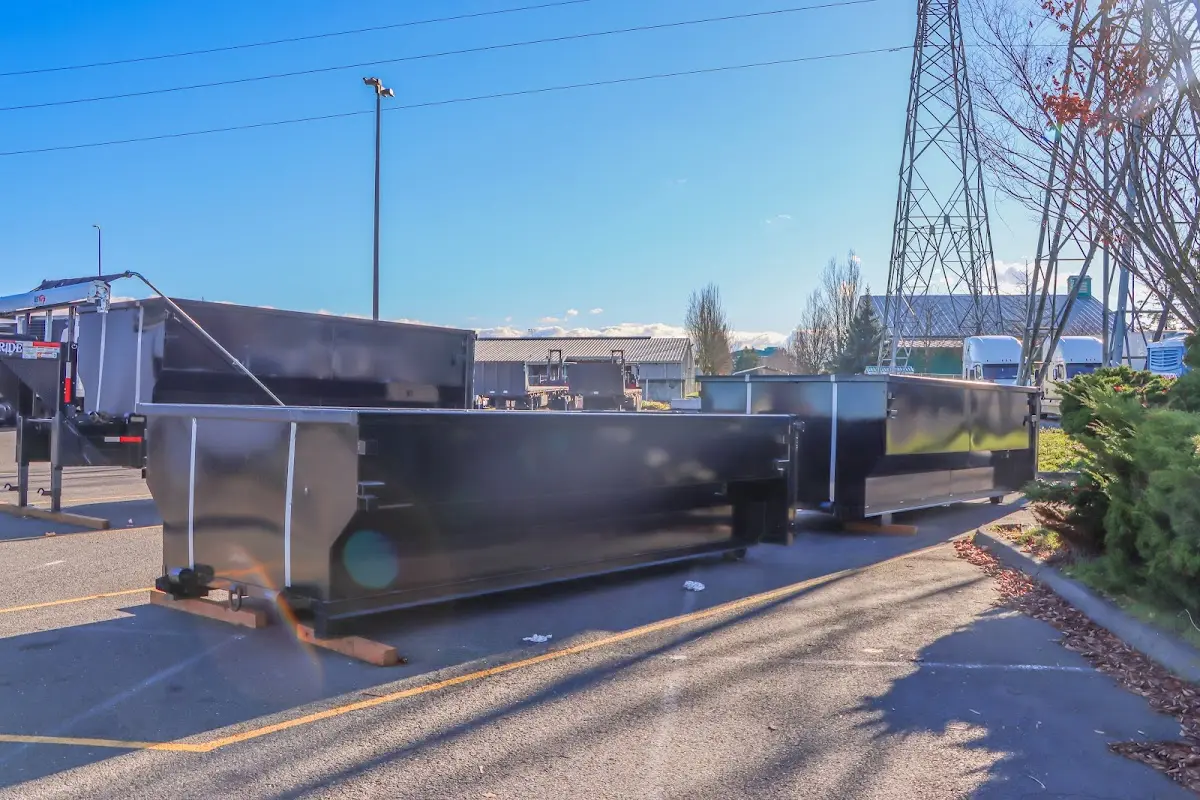 Roll-off dumpster ready for waste disposal at job site for Commercial Dumpster Rental in Grand Forks